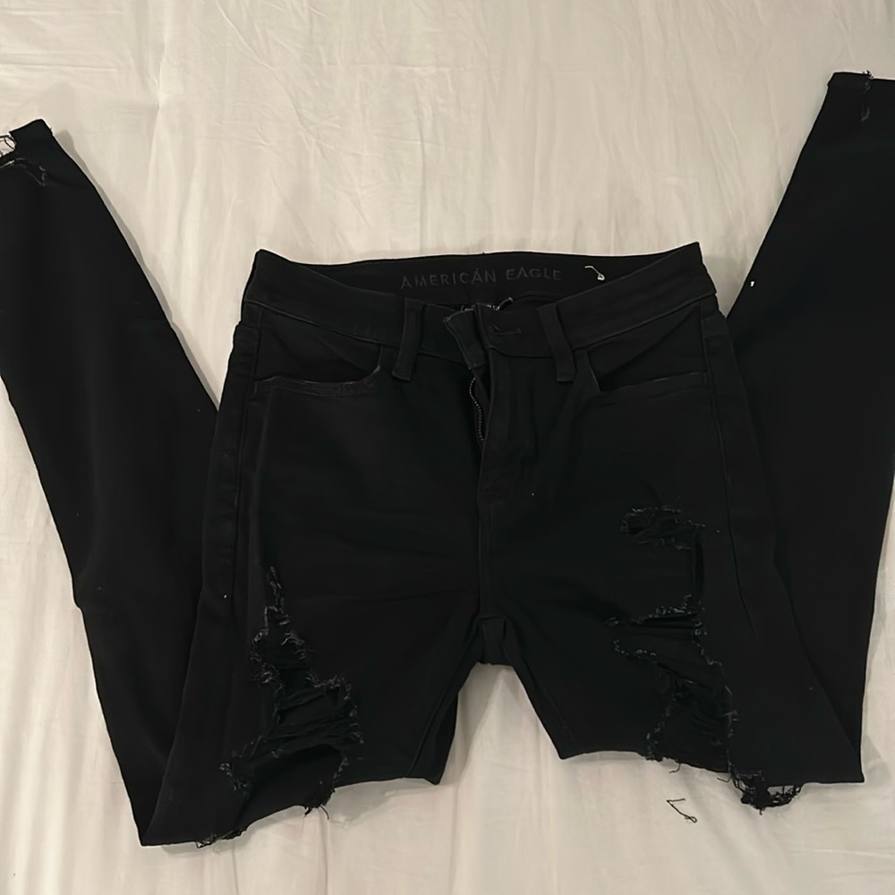 American Eagle, black ripped and distressed skinny jeans, worn twice, size 2!
